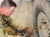 A Soldier assigned to 1st Battalion, 187th Infantry Regiment, 3rd Brigade Combat Team \"Rakkasans,” 101st Airborne Division (Air Assault), checks and refills air into a tactical vehicle on Forward Operating Base Gardez, Afghanistan, Jan. 24, 2013. The vehicle recovery team may be called out at a moment’s notice and vehicle readiness is a major requirement. (Spc. Brian Smith-Dutton/U.S. Army) 