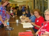 A nurse signs in to vote at Glenellen Elementary School