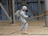 A demonstration of different repelling techniques at the Air Assault Tower.