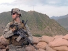 U.S. Army Spc. Anthony M. Denuzzia of Valdosta, GA, a forward observer with Company A, 2nd Battalion, 327th Infantry Regiment, Task Force No Slack, stands watch at Observation Post Coleman. The post is a historical fort that provides over watch for Combat Outpost Monti in eastern Afghanistan’s Kunar Province. (Photo by U.S. Army Staff Sgt. Gary A. Witte, 300th Mobile Public Affairs Detachment)