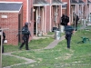 Clarksville Tactical Unit moves into position around an apartment on Ladd Street.