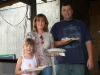 Retirement celebration trooper family prepare to sit down- Trooper Wayne Tidwell and family