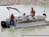 TMS Contracting moving the turbidity barrier from the mouth of the Marina Basin using a Crestliner pontoon boat on loan from Bill Roberts Thunder Road Marina.