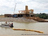 TMS Contracting moving the turbidity barrier from the mouth of the Marina Basin using a Crestliner pontoon boat on loan from Bill Roberts Thunder Road Marina.