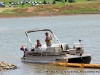 TMS Contracting moving the turbidity barrier from the mouth of the Marina Basin using a Crestliner pontoon boat on loan from Bill Roberts Thunder Road Marina.