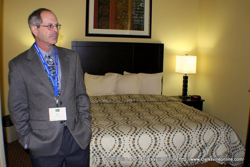 Barry Vangrove shows off a Queen Single Suite Barry Vangrove, Director of Construction & Project Management for Choice Hotels, shows off a Queen Single Suite