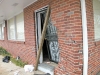 The building damage done by the impact of the 2005 Ford 500. (Photo by CPD Jim Knoll)