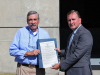 Montgomery County Sheriff John Fuson presents Doug Tackett with Proclamation from Montgomery County.