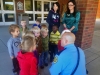 Montgomery County Sheriff's deputy Joshua Gardner teaches First Baptist First Learners Preschool children about Law Enforcement.