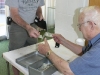 Bob Gouch collects a fish fry donation 