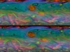 These two false-color views from NASA\'s Cassini spacecraft show detailed patterns that change during one Saturn day within the huge storm in the planet\'s northern hemisphere. (Image Credit: NASA/JPL-Caltech/Space Science Institute)