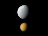 True Colors, Deceptive Sizes - Saturn\'s largest moon, Titan, appears deceptively small paired here with Dione, Saturn\'s third-largest moon, in this view from Cassini. (Image credit: NASA/JPL-Caltech/SSI)