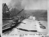 Work is ongoing at Lock and Dam 1 on the Cumberland River in Nashville, Tenn., Oct. 9, 1931. The view is towards left bank. The U.S. Army Corps of Engineers Nashville District built Lock and Dam 1 at this location to establish a navigation channel. The structure was later replaced by today's modern dams. (USACE Photo)