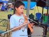 Young flutist entertains the Powwow