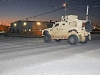 Soldiers of the 2nd Battalion, 327th Infantry Regiment, 1st Brigade Combat Team, 101st Airborne Division, drive their Mine-Resistant Ambush Protected vehicles at night during their driver certification Nov. 17th, outside their battalion here. (Photo by Sgt. Richard Daniels Jr.)