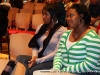 Two young women watch the inauguration