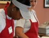 Clarissa makes a pizza as Mary watches