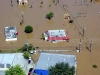 An aerial view of the submerged McDonald\'s Restaurant on Riverside Drive during the Great Flood of 2010 (Larson Enterprises)