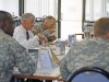 Secretary of the Army John McHugh eats lunch with soldiers from 101st Airborne Division (Air Assault) at Fort Campbell while answering questions August 11th. (Photo by Sgt. Scott Davis)