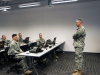 Sergeant Major of the Army Raymond F. Chandler III interacts with Soldiers during an Advanced Field Artillery Tactical Data Systems Class at the Kinnard Mission Training Complex, Sept. 5, 2014, at Fort Campbell. Ky. The AFATDS provides a fully integrated fire support command and control system. (U.S. Army photo by Staff Sgt. Candice Funchess, 101st Airborne Division (Air Assault) Public Affairs)