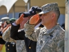 Sergeant Major of the Army Raymond F. Chandler III renders a hand salute as the colors are being posted during the 555th Parachute Infantry Association monument dedication, Sept. 4, 2014, at Fort Campbell, Ky. (U.S. Army photo by Staff Sgt. Candice Funchess, 101st Airborne Division (Air Assault) Public Affairs)
