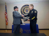 Sergeant Terry Minton is congratulated by Clarksville Police Chief Al Ansley during his retirement ceremony. (Jim Knoll, CPD)