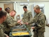 Soldiers deployed to Afghanistan enjoy a large Christmas lunch on Christmas Day. The dining facility maximized every effort to ensure the Soldiers experienced the best dining expeience possible while deployed away from their familes during the holiday season. (U.S. Army photo by Sgt. 1st Class Abram Pinnington, TF 3/101 Public Affairs)