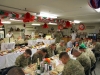 Soldiers deployed to Afghanistan enjoy a large Christmas lunch on Christmas Day. The dining facility maximized every effort to ensure the Soldiers experienced the best dining expeience possible while deployed away from their familes during the holiday season. (U.S. Army photo by Sgt. 1st Class Abram Pinnington, TF 3/101 Public Affairs)