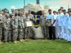 The Strike culinary Soldiers from Headquarters and Headquarters Company, 526th Brigade Support Battalion, 2nd Brigade Combat Team, 101st Airborne Division (Air Assault) and staff members of the Strike Dining Facility surround Strike Rock and pose for a group photo following an award ceremony held at Fort Campbell, Ky., May 16. The winning teams were recognized by Brig. Gen. Mark R. Stammer, acting commander of the 101st Airborne Division and Fort Campbell, for winning the Army level Philip A. Connelly competition and awarded the Commanding General’s Best Dining Facility Award for the 2nd quarter fiscal year 2013.(U.S. Army photo by Sgt. Joe Padula, 2nd BCT PAO, 101st Abn. Div.)