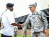 Brig. Gen. Mark R. Stammer, acting commander of the 101st Airborne Division (Air Assault) and Fort Campbell, congratulates Sgt. 1st Class Terrilski Davis, the senior food service specialist with Headquarters and Headquarters Company, 526th Brigade Support Battalion, 2nd Brigade Combat Team, 101st Abn. Div., outside of the Strike Dining Facility, May 16. Davis was the team leader of the Soldier Chefs who competed and won the Army wide Philip A. Connelly competition. The official award ceremony for the Connelly competition is scheduled to be held at Fort Lee, Va.(U.S. Army photo by Sgt. Joe Padula, 2nd BCT PAO, 101st Abn. Div.)