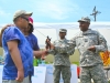 Command Sgt. Maj. Gerald Roberson, the command sergeant major of the 526th Brigade Support Battalion, 2nd Brigade Combat Team, 101st Airborne Division (Air Assault), presents the special needs student athletes of Fort Campbell with the War Fighter Award during the Area 12 Special Olympics held at Clarksville’s Austin Peay Stadium, April 18. The War Fighter Award is a trophy in the shape of a Soldier’s silhouette, decorated with the 526th insignia.(US Army photo by Sgt. Keith Rogers, 2nd BCT UPAR, 101st Abn. Div.)