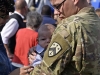 Spc. Steven Schaffner, 230th Signal Company, holds his son, Niko, upon returning home from a year-long deployment overseas Oct 14. He saw his son one other time when he went on leave prior to returning home. The unit provided information technology support, fiber-optic connections, and network support for U.S. troops throughout the Middle East including Kuwait, Iraq and Afghanistan. (Spc. Lauren Ogburn, Tennessee National Guard Joint Force Headquarters).