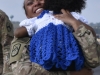 Spc. Teneya Gladney, 230th Signal Company, hugs her daughter, Aniyah, when the unit returned from year-long deployment Oct. 14. The unit provided information technology support, fiber-optic connections, and network support for U.S. troops throughout the Middle East including Kuwait, Iraq and Afghanistan. (Spc. Lauren Ogburn, Tennessee National Guard Joint Force Headquarters).