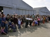 Families and friends eagerly wave to the Soldiers of the Tennessee National Guard’s 230th Signal Company, based in Nashville, Tenn., who just returned home from a year long deployment overseas Oct. 14. (Spc. Lauren Ogburn, Tennessee National Guard Joint Force Headquarters).