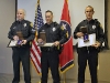 Officers Wilson, Danault, and Lee with their medals. (Photo by CPD-Jim Knoll)