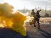 After clearing their way to a village, infantrymen from 1st Battalion, 187th Infantry Regiment, 3rd Brigade Combat Team, 101st Airborne Division (Air Assault) begin to clear each building in the village while also watching for the notional opposing force fighting from across the street at Muscatatuck Urban Training Center, Indiana on Dec. 7, 2018. (Sgt. Patrick Kirby, 40th Public Affairs Detachment)