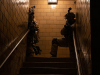 After clearing their way to a village, infantrymen from 1st Battalion, 187th Infantry Regiment, 3rd Brigade Combat Team, 101st Airborne Division (Air Assault) begin to clear each building in the village while also watching for the notional opposing force fighting from across the street at Muscatatuck Urban Training Center, Indiana on Dec. 7, 2018. (Sgt. Patrick Kirby, 40th Public Affairs Detachment)