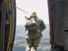 A Soldier from the 861st Quartermaster Company jumps out of a C-130 to Corregidor Drop Zone at Fort Campbell, Kentucky, on Saturday, Aug. 27.