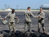 Soldiers of the 861st Quartermaster Company unload parachutes at the airfield in Nashville on Saturday, Aug. 27, in preparation for a jump latrer in the day at Fort Campbell, Kentucky.