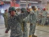 Staff Sgt. Travis Merryman, from Mt. Juliet, Tennessee, signals to other patachute riggers from the 861st Quartermaster Company during training to prepare for a jump later in the day Saturday, Aug. 27, at Fort Campbell, Kentucky.