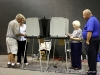 Two men ready to cast their ballot at Hilldale United Methodist Church (District 19)