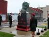 The Montgomery Central JROTC Honor Guard stand a silent vigil around the War Memorial