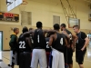 Soldiers from the Strike team, 2nd Brigade Combat Team, 101st Airborne Division (Air Assault), huddle during the quarterfinal halftime of the first game at Fort Campbell’s Lozada Gym, Aug. 13. The words of encouragement put out in the group during the quarterfinal halftime, helped lead them to their first win of the competition. (U.S. Army photo by Spc. Paul Russ, 2nd BCT PAO, 101st ABN. DIV.)