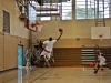 A soldier from 2nd Brigade Combat Team, 101st Airborne Division (Air Assault), goes for the slam dunk during warm-up prior to the start of the first game of the basketball tournament. The tournament is being hosted at Fort Campbell’s Lozada Gym during the week of Aug. 13. (U.S. Army photo by Spc. Paul Russ, 2nd BCT PAO, 101st ABN. DIV.)