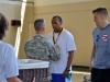 Sgt. Charles Joseph, an infantryman with Company B, 2nd Battalion, 502nd Infantry Regiment receives the silver medal for second place, after a 56-51 loss against the 3rd Battalion, 5th Special Forces Group on Aug.15, at Lozada Gym. The basketball competition was one of fourteen events held during the Week of the Eagles. (U.S. Army photo by Spc. Paul Russ, 2nd BCT PAO, 101st ABN. DIV.)