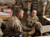 Spc. Jennifer Benevente, D Troop, 2nd Squadron, 17th Cavalry avionics repair specialist receives a shift briefing from Sgt. Alcone Levier, D, 2-17 CAV avionics repair noncommissioned officer to establish the order of work at Forward Operating Base Fenty, Afghanistan Dec. 6. (U.S. Army photo by Sgt. Duncan Brennan, 101st CAB public affairs)