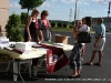 Sign-in table staff welcomes guests