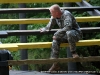 1st Lt. Joey Keller encourages his team mate 2nd Lt. Rob Eberts on the Weaver obstacle