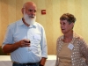 Author Barry Kitterman (l) chats with unidentified dinner guest