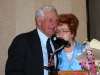 John Seigenthaler, keynote speaker, hugs Patricia Winn, conference chairperson